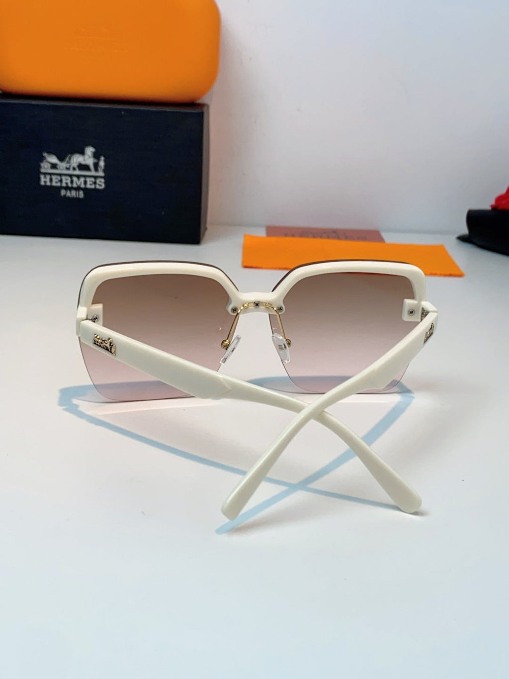 Hermès Lightweight Rimless Brown Lens Sunglasses for Men & Women - detail image 3